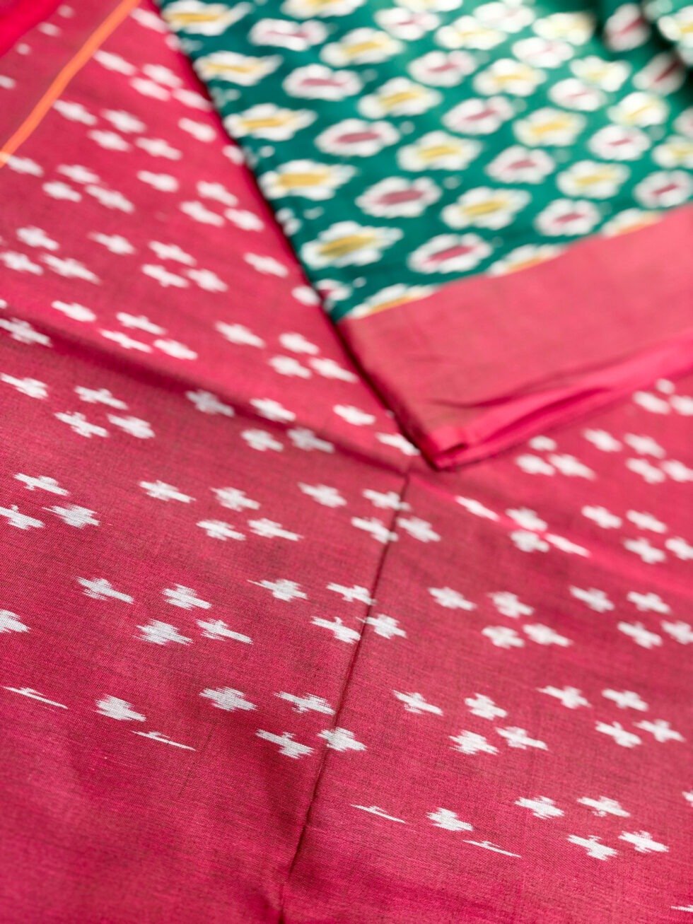 traditional-handloom-ikkat-saree-featuring-rani-pink-border-and-bottle-green-body