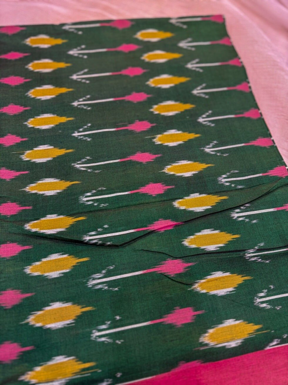 pure-handloom-ikkat-saree-in-bottle-green-and-rani-pink-with-traditional-ikkat-weaving